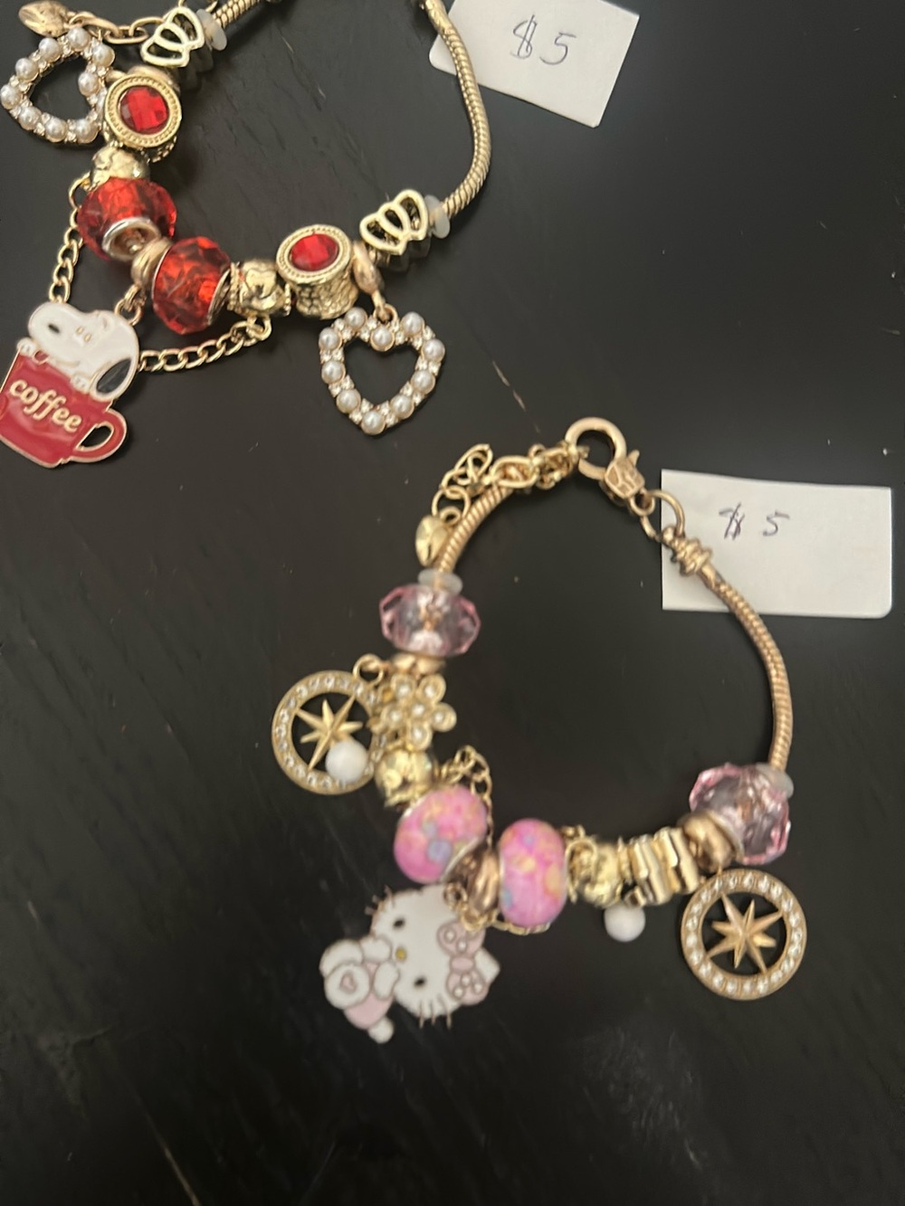 Gold-Tone Pink Charm Bracelet with Hello Kitty Accent check my profile for more